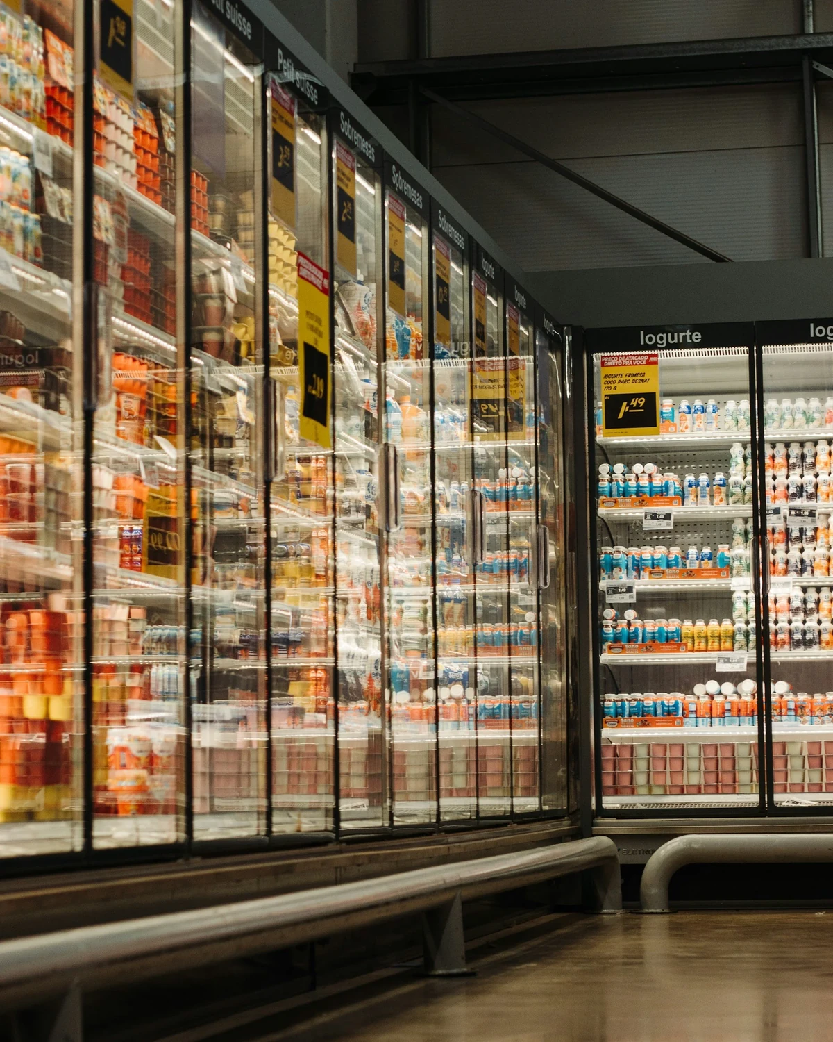 Glass-door refrigerated display cases in a grocery store